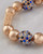 Stylish pavé bracelet with blue crystals detailing. View Product Image