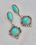 A slightly different version of sterling silver matrix turquoise earrings with a handcrafted, ornate, unique design and bold style. View Product Image
