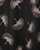 A close up of an artistic leaf scarf with black and white ginkgo design. View Product Image