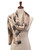 White reversible scarf with black ginkgo leaf pattern draped on a mannequin. View Product Image