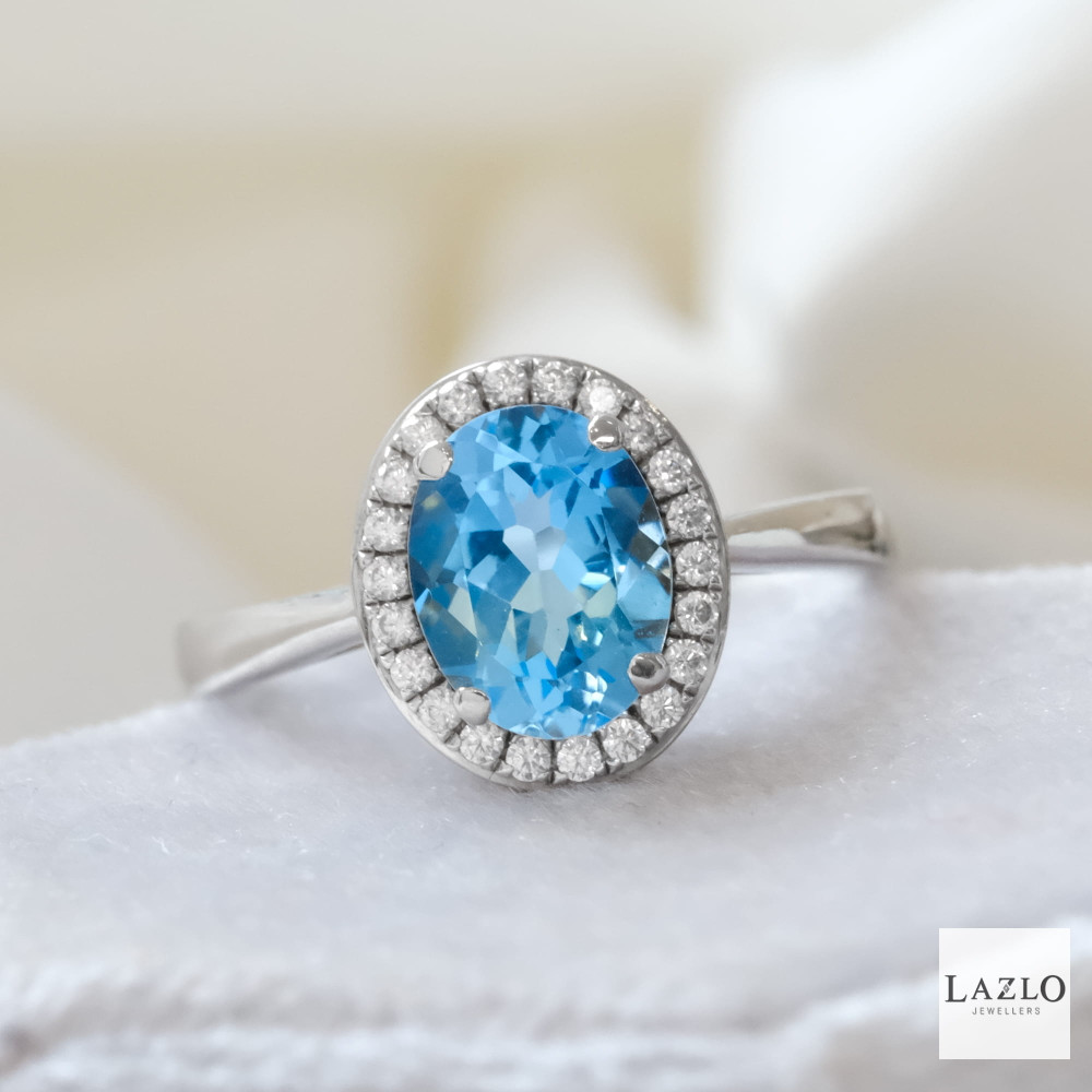 Sterling Silver Oval Blue Topaz & CZ Surround Cluster Ring 1