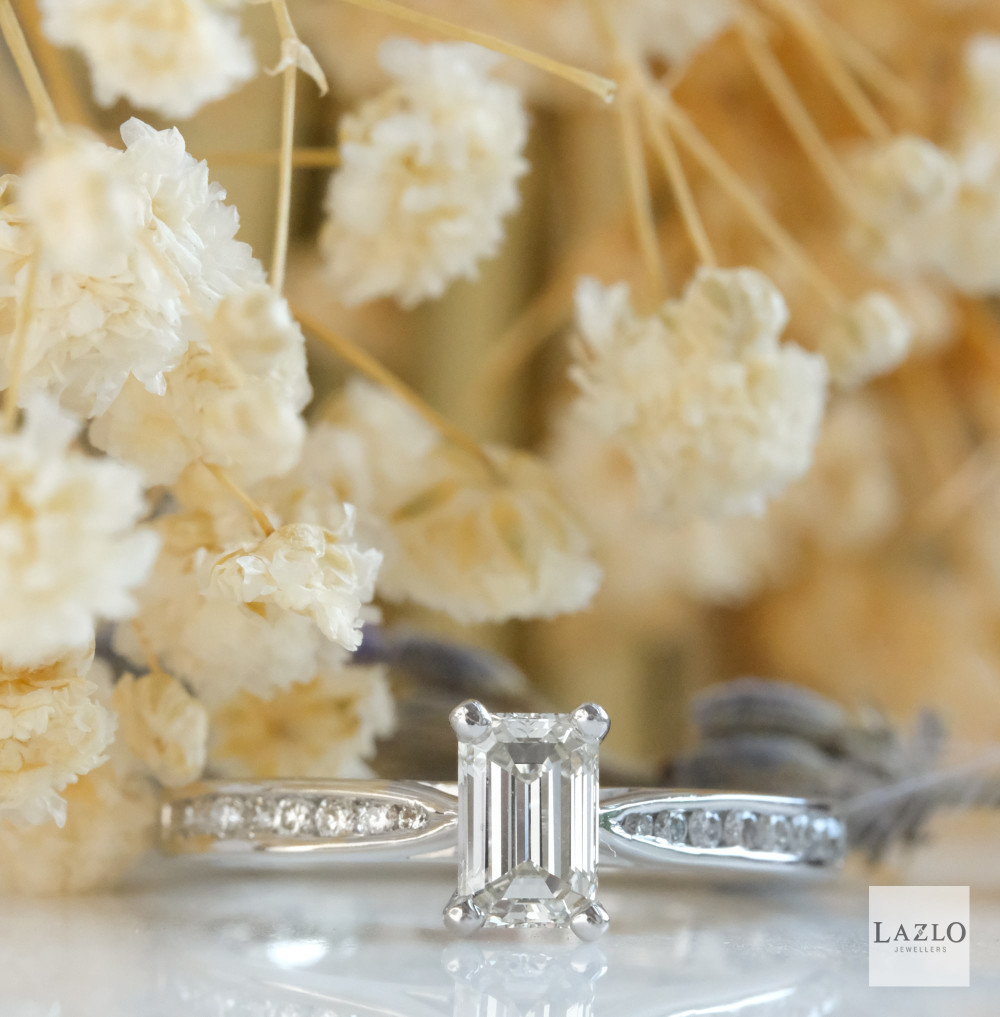 18kt White Gold Solitaire Emerald Cut 0.63ct Diamond Engagement Ring 1