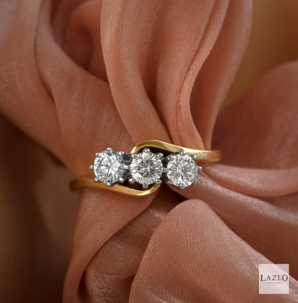 18kt Yellow Gold 0.75ct Three Stone Twist Engagement Ring 1