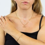 9kt Yellow Gold T Bar Necklace on Model with hand