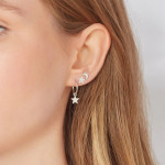 9kt white gold drop star earrings on model