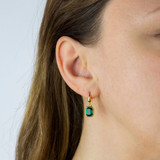 sterling silver & gold plated emerald crystal earrings on model sterling silver & gold plated emerald crystal earrings on model