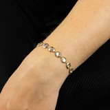 9kt yellow gold white diamond tennis bracelet on model