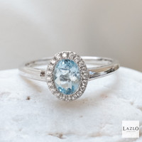 Sterling Silver Oval Shaped Aquamarine & CZ Cluster Ring