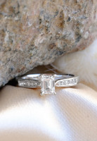 18kt White Gold 0.70ct Emerald Cut Solitaire & 0.17ct Diamond Shoulder Ring 1