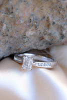 18kt White Gold 0.70ct Emerald Cut Solitaire & 0.17ct Diamond Shoulder Ring 7