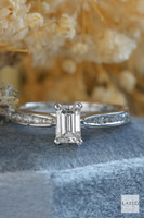 18kt White Gold Solitaire Emerald Cut 0.63ct Diamond Engagement Ring 4