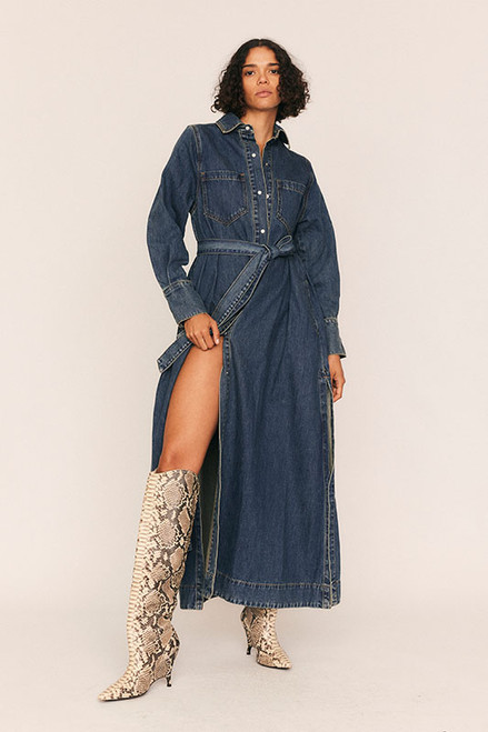 We've put our Bohemian Traders spin on classic workwear to create this blue denim shirt dress, which features a detachable self belt. It has a slimmer fit than it's Opera Shirt Dress companion. 