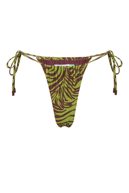 Mix playful detail with flattering fit in this bikini brief. Side ties and adjustable gathers complement the sleek silhouette in our iconic zebra print, fully lined for confidence and comfort.