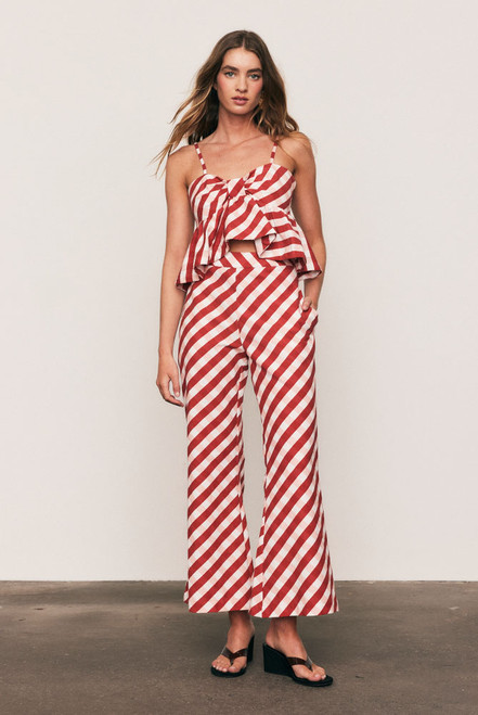 Tailored from a cotton–linen blend, the Gingham Crop Flare Pant offers relaxed structure and playful polish. The mid-rise waist and flared cropped leg shape make it ideal for summer dressing. Pair it with the matching Gingham Bodice Top or Gingham Check Shirt for a coordinated festive look that moves easily from day to soirée.