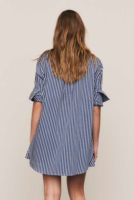 Timeless and versatile, the Stripe Classic Shirt is crafted from a premium Rayon–Tencel blend in a crisp stripe that drapes with ease. Designed in an oversized silhouette with a classic collar and subtle red Bohemian Traders embroidery, it pairs perfectly with the matching Stripe Short for an elevated, coordinated take on modern summer shirting.