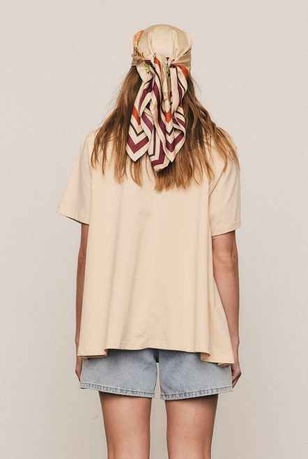 Soft, breathable, and easy to love, the Oversized Swing Tee in Macadamia is cut from a cotton blend jersey with a flowing hem for effortless movement. Designed for machine-washable simplicity and lasting comfort, it’s a natural choice for everyday wear.