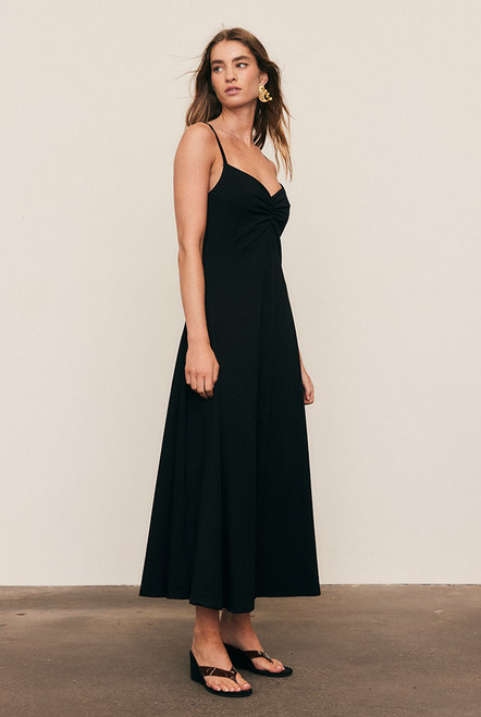 Every season we like to design a staple black dress and this one is not to be missed. It has a tank-inspired bodice and falls to a full skirt cut from crisp poplin.