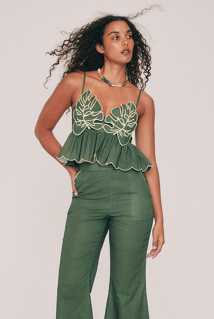 Cut from textured cotton slub, this olive crop top is finished with embroidered leaf detailing to the bust and a scalloped hem, drawn by hand in our Central Coast studio. A concealed zip sits at the centre back. For summer weddings, wear it with the Fern crop flare pant, or keep it casual with denim shorts and very little else. True to size, designed from a 6 to a 22.
