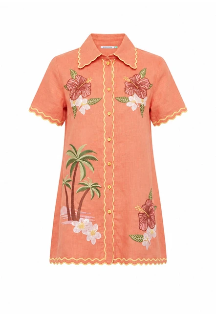 Cut from premium linen, this coral mini shirt dress is traced with hand-drawn tropical embroidery along a scalloped silhouette. Straight through the body with short sleeves, it buttons the whole way down, so it works as a dress, as a jacket over a slip, or thrown over swimmers on the walk back from the water. True to size, designed from a 6 to a 22.