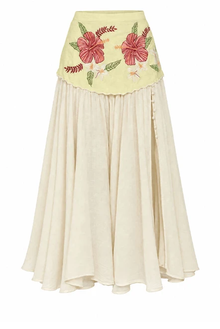 Cut from soft cotton crepe, this cream midi skirt falls from a fitted linen yoke carrying hand-drawn Paloma embroidery. A high split, fastened with buttons, lends movement, while a concealed zip sits at the centre back. The skirt that makes a plain white tee look considered, or choose to style it with the coordinating top and wear it to a summer wedding. This one won't last, add to cart before it's gone. Designed from a 6 to a 22.