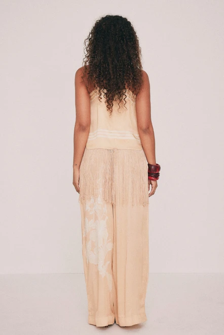Cut from fluid viscose satin, this cream pant is placement printed with the Kai design drawn in our Central Coast studio. An elasticated waist, relaxed leg and pockets set into the side seams ensure it is as practical as it is comfortable. Wear it with the matching slip top for dinner, with golden accessories and a basket bag. Designed from a 6 to a 22.