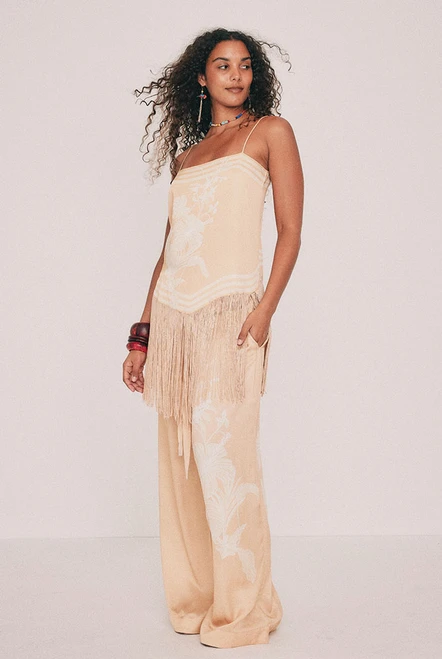 Cut from fluid viscose satin, this cream pant is placement printed with the Kai design drawn in our Central Coast studio. An elasticated waist, relaxed leg and pockets set into the side seams ensure it is as practical as it is comfortable. Wear it with the matching slip top for dinner, with golden accessories and a basket bag. Designed from a 6 to a 22.