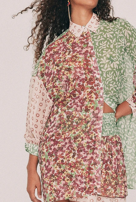 Cut from soft georgette, this oversized shirt carries the spliced Ola design, drawn by hand in our Central Coast studio. A classic collar, long cuffed sleeves and a full button front lend it the ease of a borrowed-from-the-boyfriend shirt. Wear it buttoned and tucked into the coordinating skirt, open over a slip, or over swimmers on the walk back from the beach on your summer vacation. Intended to be oversized, so size down for a closer fit, or lean in to the design and take your usual size. Designed from a 6 to a 22.