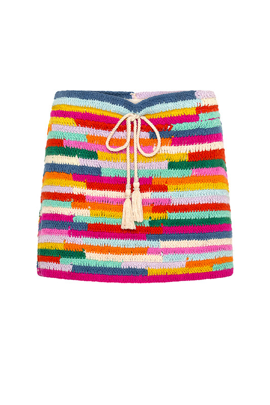 This hip sitting mini skirt will serve you well on sunny vacations for years to come. Made by hand from multi coloured cotton yarn, it has a drawcord and tassels to the centre front and looks equally as great with sandals, slides and boots. Wear yours with the matching top for maximum style mileage.