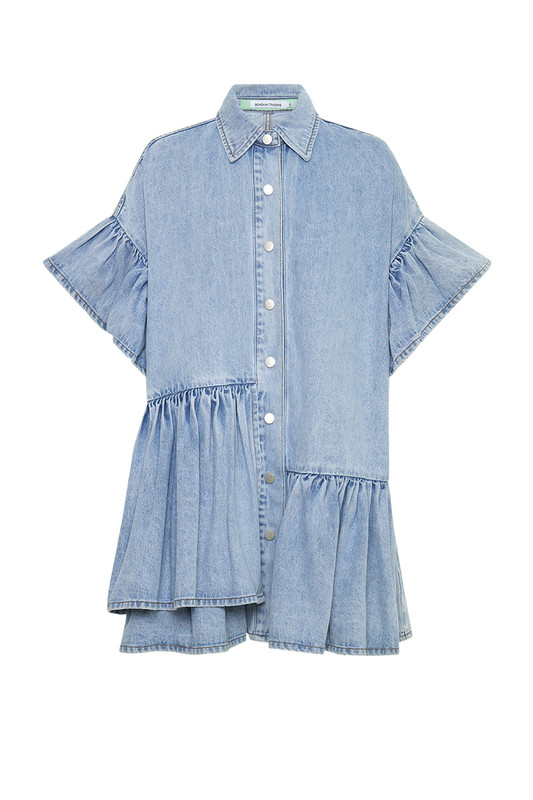 The ever changing Australian seasons influence Bohemian Traders' breezy, oversized designs. This 'Genoa' mini dress is cut from ice blue denim and has asymmetrical ruffles along the hem that effortlessly drape over your frame. Team yours with sandals and a basket bag or over the co-ord jean as the weather cools.