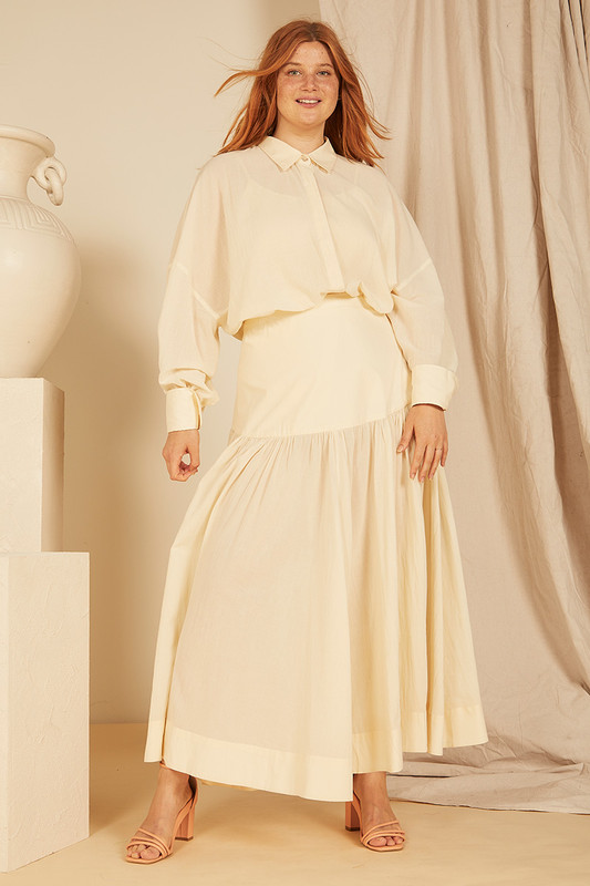 This Cloud Yoke Midi Skirt is a versatile treasure that will work for all kinds of occasions from warm-weather picnics to summer soirees. It's made from lightweight cotton voile and has a yoke-detailed waist and a buttery cream colour making it feel like a prized vintage piece. Wear yours with the coordinating shirt.