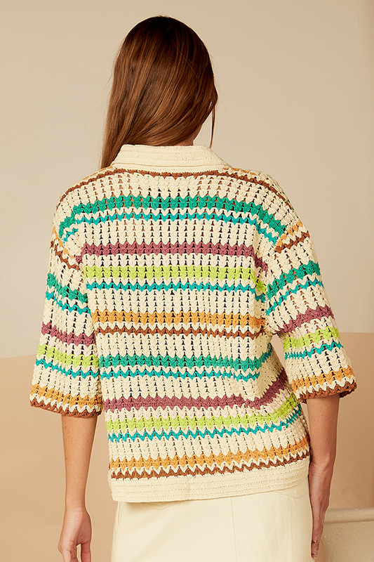 Each season Bohemian Traders creates a capsule of crochet hand crafted by artisans in India. With a color palette borrowed from '70s California this crochet-knitted shirt threads a kaleidoscope of stripes into a wardrobe masterpiece. Dropped shoulders and chunky tort buttons mean you can wear this anywhere.