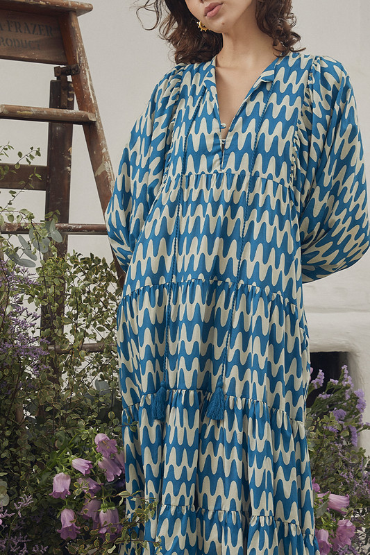 With its voluminious sleeves and tiered hemline, BT's Electromagnetic Wave Dress is so clearly influenced by the '70s. It's made from natural cotton-voile with a blue wave print throughout and a midi length that works beautifully with sandals in the summer.
