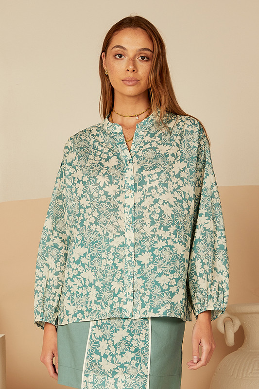 BT's 'posey' puff sleeve blouse has a loose, breezy shape that's gathered along the shoulders. Made from cotton, it's printed with vintage-inspired flowers and has shell buttons.