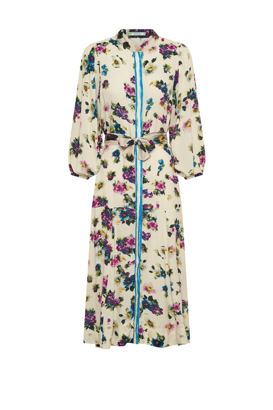 Bohemian Traders Drop Waist Midi Dress is beautifully patterned with vintage florals. Made from breathable rayon, it has dolman sleeves and a contrast sash that cinches the shape. Match your accessories to one of the colors in the print.