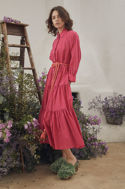 Bohemian Traders slim fit shirt dress is made from lightweight cotton-voile in a mood-boosting fuchsia colourway, styled with a contrasting coral rope belt. It's cut for a slim for through the bodice and is enhanced by the tiered midi skirt.