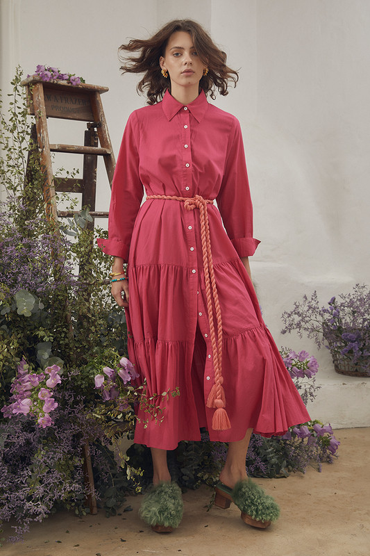 Bohemian Traders slim fit shirt dress is made from lightweight cotton-voile in a mood-boosting fuchsia colourway, styled with a contrasting coral rope belt. It's cut for a slim for through the bodice and is enhanced by the tiered midi skirt.