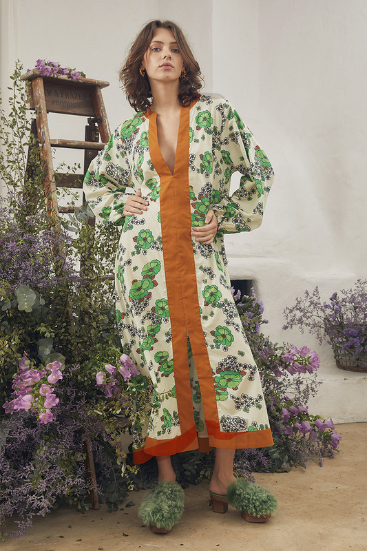 The perfect beach coverup, this floral kaftan is made from lightweight cotton cut for a breezy, loose fit. It's printed with our bespoke 1970s inspired Peridot floral and has a contrasting terracotta placket to the centre front. Wear yours with tan accessories and a basket bag.