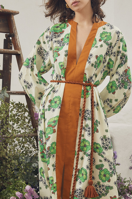 The perfect beach coverup, this floral kaftan is made from lightweight cotton cut for a breezy, loose fit. It's printed with our bespoke 1970s inspired Peridot floral and has a contrasting terracotta placket to the centre front. Wear yours with tan accessories and a basket bag.