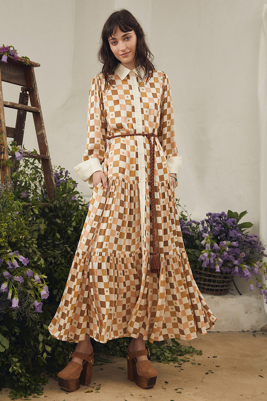 This A-line maxi dress is printed with a tonal check in autumnal shades of coral and brown and scatterd with a delicate honey bee. It's cut from weighty satin crepe that skims your frame and has a decadent ruffled skirt. Wear yours with mules and a tote.