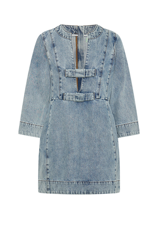 This update on the classic denim mini dress is effortlessly cool. It has a long sleeve design with structural seams through the waist and panels at the back for a slim fit. The front neckline is adorned with tonal denim bows. Wear yours with sandals or gazelles.