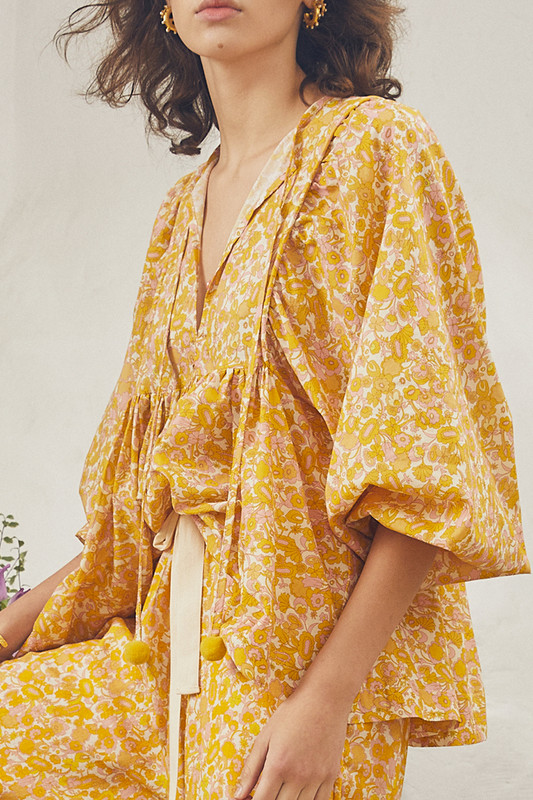 Our Ashbury boho blouse is cut from airy cotton voile and printed with a delicate tonal honey palette. It has a relaxed shape and rouleau ties at the neckline.