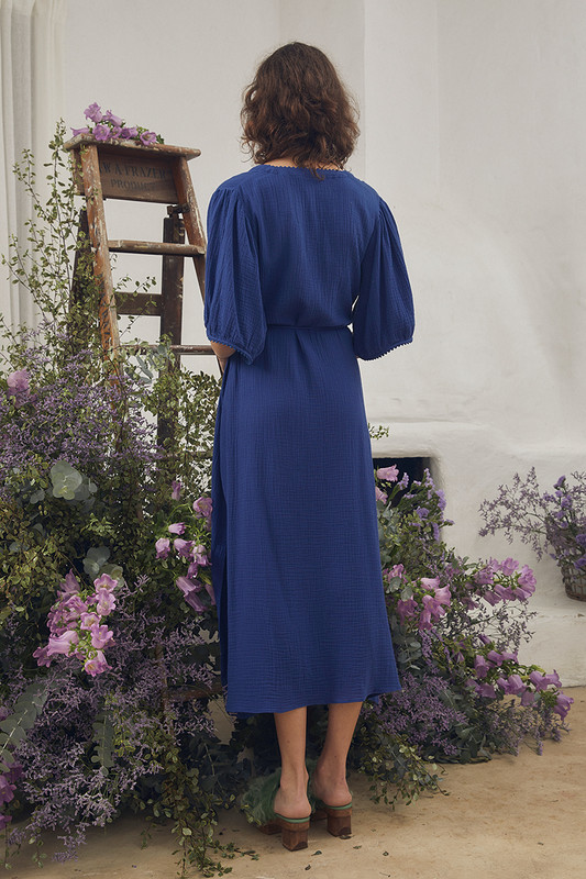 The easy appeal of this simple 'gypsy' dress is enhanced by its pretty details. Cut from breezy cotton gauze, it features puffed sleeves and a collarless neckline with subtle splits to the side seams. Use the belt to enhance your natural curves.