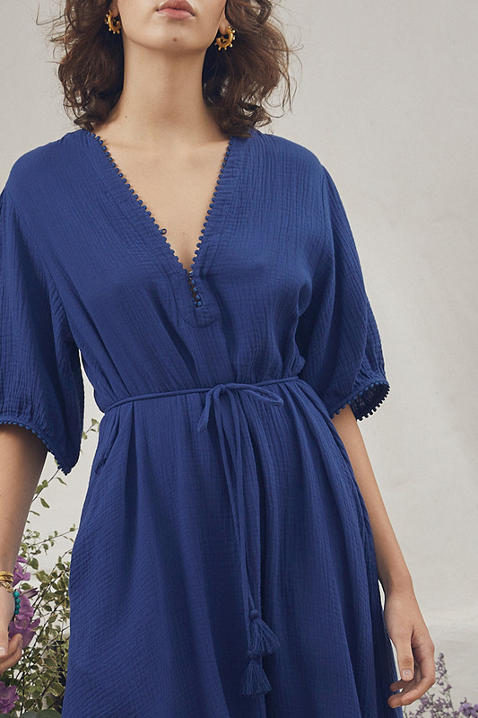The easy appeal of this simple 'gypsy' dress is enhanced by its pretty details. Cut from breezy cotton gauze, it features puffed sleeves and a collarless neckline with subtle splits to the side seams. Use the belt to enhance your natural curves.