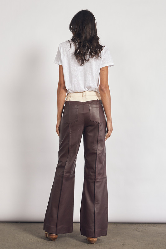 The Valerie Leather Spliced Pant are the perfect foundation piece - style them with everything from breezy blouses to graphic tees or chunky boucle sweaters in citrus tones. Cut from genuine leather, they're designed to sit on the mid waist and have a boot leg so they fall perfectly over your winter boots.