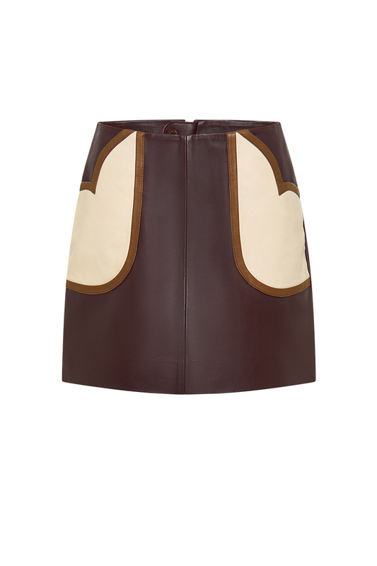 Rich chocolate browns are so covetable this season - Bohemian Traders Valerie Mini Skirt will give you the wardrobe boost you're looking for. It's cut from leather in an A-line shape and detailed with vintage inspired curved pockets in contrasting cream and tan. Team it with everything from a white tee to the BT Oversized Shirt in Cloud.