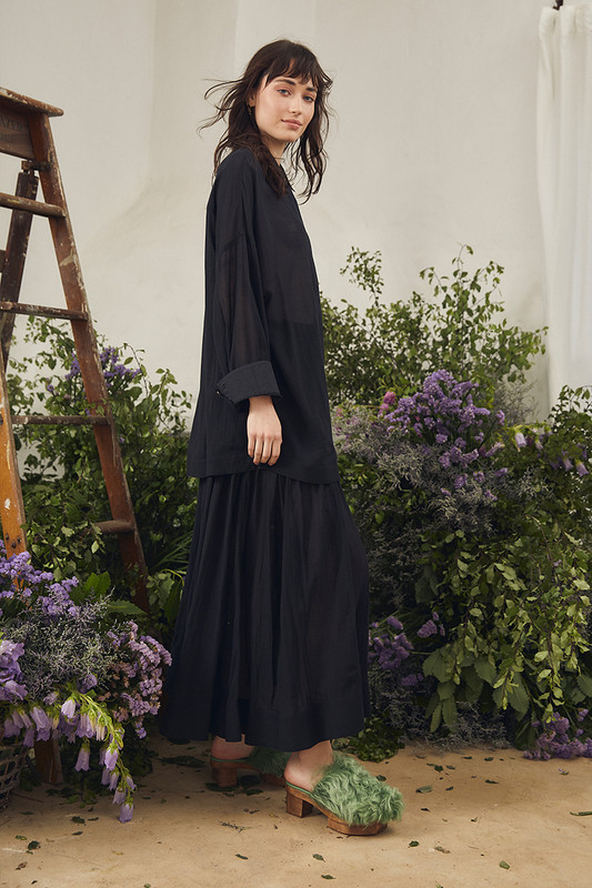 This Ink Yoke Maxi Skirt is a versatile treasure that will work for all kinds of occasions from warm-weather picnics to winter soirees. It's made from lightweight cotton voile and has a yoke-detailed waist and an inky black colour making it feel like a prized vintage piece. Wear yours with the coordinating shirt.