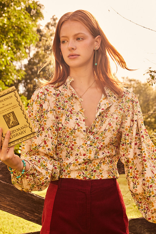 This easy wearing blouse has a relaxed shape with buttons to the front. Made from cotton seersucker, it's printed with vintage-inspired flowers. Finish your outfit with the coordinating cords.