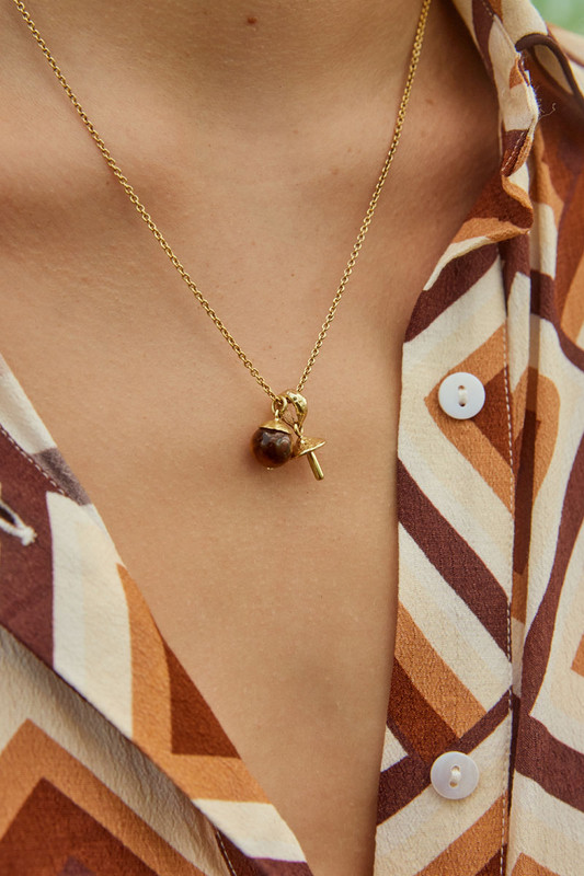 BT's necklace features a hand crafted mushroom pendant alongside a tigers eye sphere. It's crafted from nano plated brass and strung on a 50cm chain.
