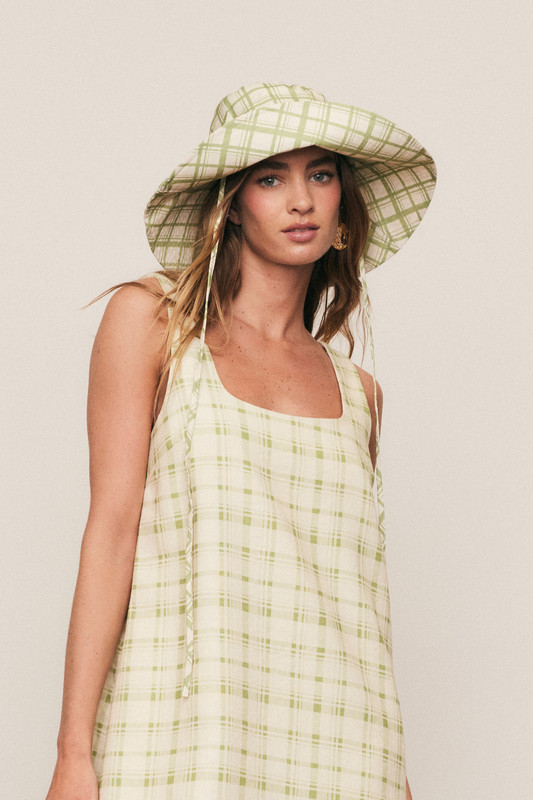 Our 'Frankie' bucket hat is made from breathable linen and has coordinating ties, so you can tweak the shape.