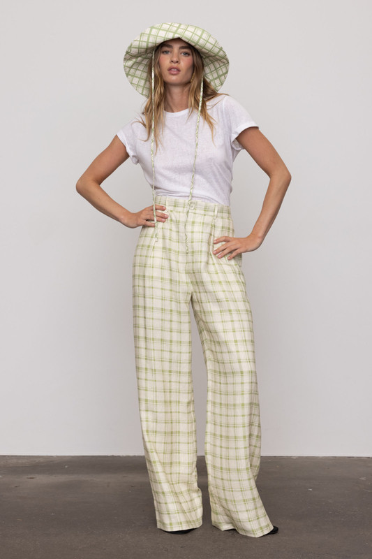 Our 'Frankie' trousers are patterned with classic plaid in a subdued leaf green, making them completely versatile. They're tailored from linen with a high-rise waist that falls to sweeping wide legs. Style yours with the matching Blazer.